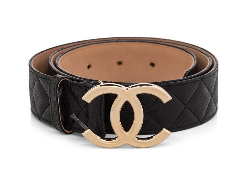 Chanel, Quilted Leather CC Buckle Belt: Chanel, Quilted Leather CC Buckle Belt Belt in quilted black caviar leather with gold-tone metal CC buckle. Lined in beige suede leather. Stamped "CHANEL / MADE IN ITALY" at back. Label: Chanel