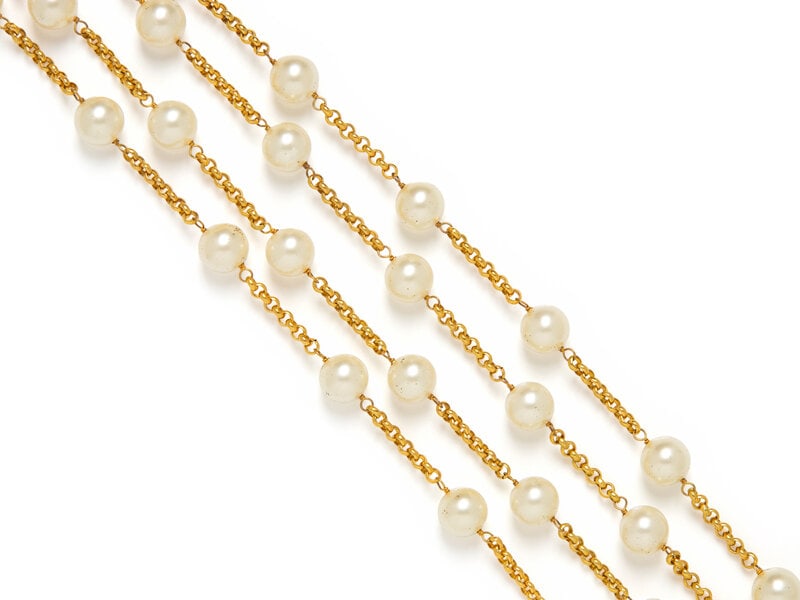 Chanel, Long Gripoix Pearl Sautoir: Chanel, Long Gripoix Pearl Sautoir Long sautoir in gold-tone metal with Gripoix pearl beads. Spring-loaded clasp closure. Marked with maker's marks at hanging tag and at chain. Label: Chanel Date: