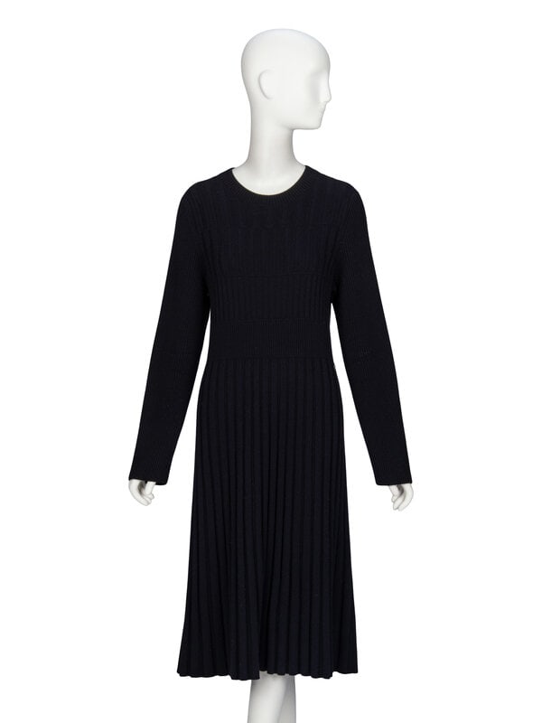 Chanel, Black Wool Knit Dress: Chanel, Black Wool Knit Dress Long-sleeved sweater dress in black wool ribbed knit; moderate stretch content. Flat round collar. Full-length fitted sleeves. Slightly waisted silhouette. Mid