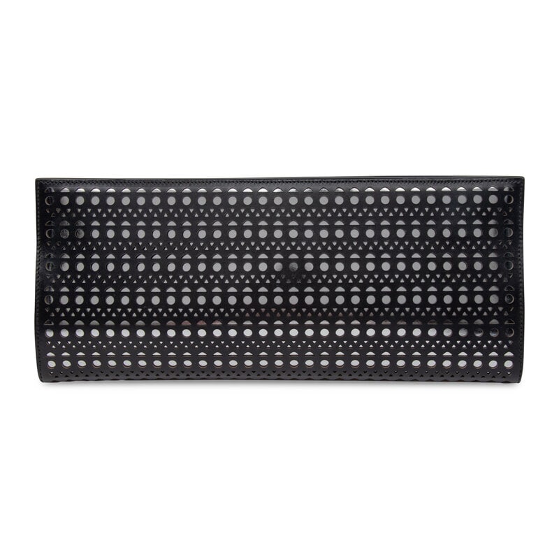 Alaïa, Laser-Cut Leather Clutch: Alaïa, Laser-Cut Leather Clutch Clutch in black laser-cut and metallic silver leather. Magnetic closures and retractable leather-covered mirror charm. Label: Alaïa Style/Serial No.: