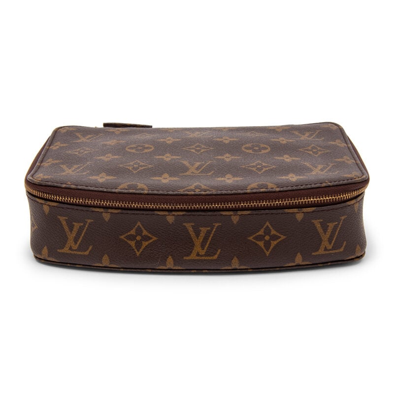 Louis Vuitton, Monogram Monte Carlo Travel Jewelry Case: Louis Vuitton, Monogram Monte Carlo Travel Jewelry Case Monte Carlo Travel Jewelry Case in monogram print coated canvas with locking zipper closure. Label: Louis Vuitton Style/Serial No.: MI0968