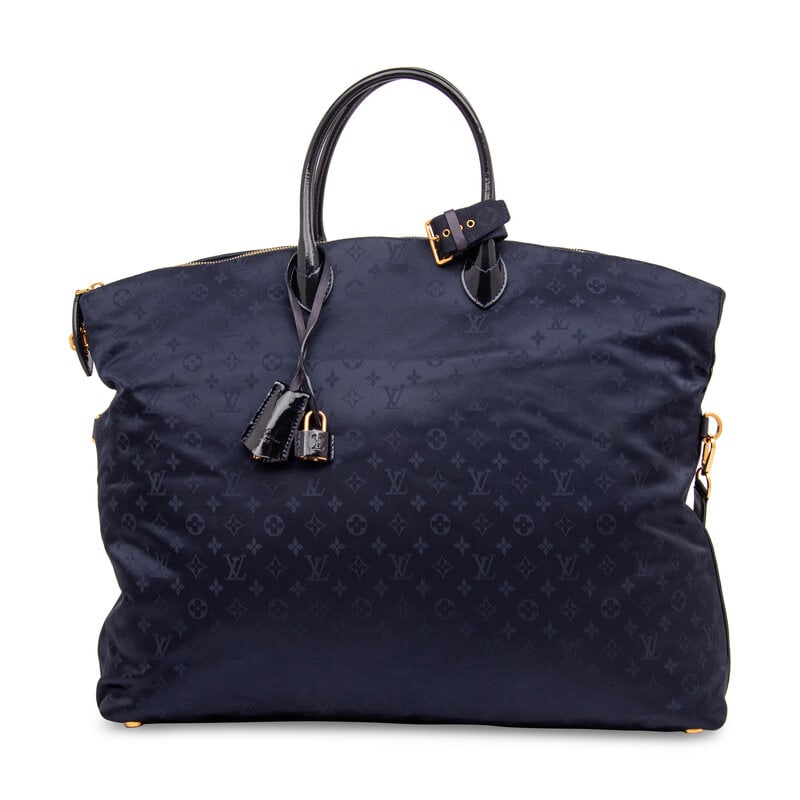 Louis Vuitton, Monogram Desire Lockit Vertical GM Tote: Louis Vuitton, Monogram Desire Lockit Vertical GM Tote Monogram Desire Lockit Vertical GM tote bag in navy monogram nylon jacquard with navy patent leather trim. Locking zipper closure, rolled