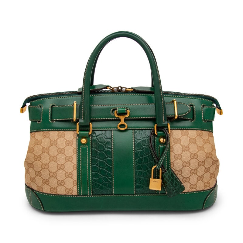 Gucci, Monogram Secret Satchel with Crocodile Trim: Gucci, Monogram Secret Satchel with Crocodile Trim Secret Satchel handbag in GG monogram canvas and green leather with green crocodile skin trim. Double-ended zipper closure and rolled leather