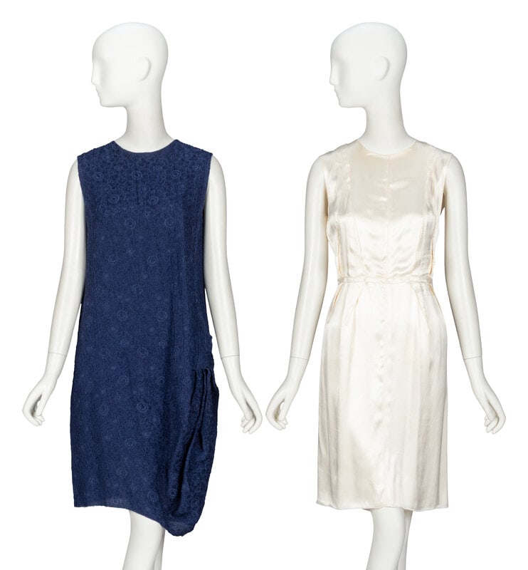 Lanvin, Two Sleeveless Dresses: Lanvin, Two Sleeveless Dresses THE FIRSTAsymmetrical shift dress in navy floral-motif silk cloqué. Round collarless neckline; sleeveless. Asymmetric tucks & pleats at left hi