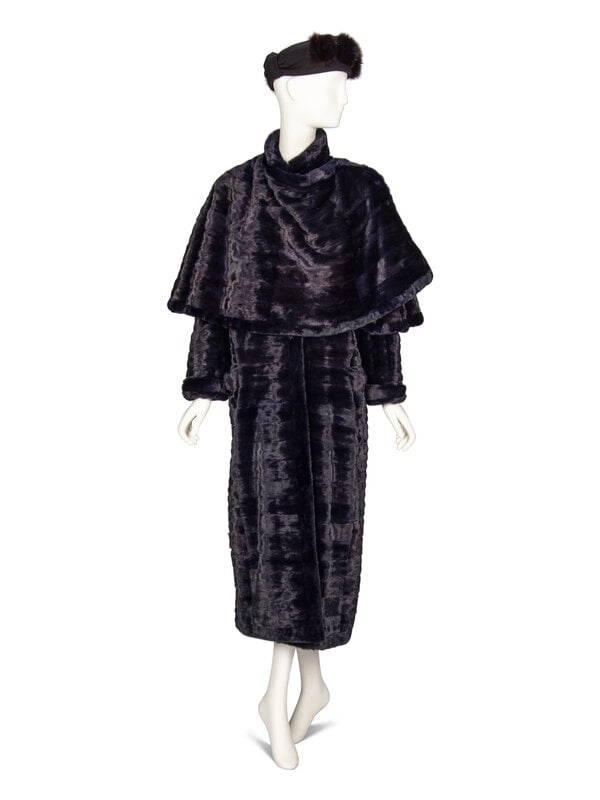 J. Mendel, Navy Ermine Fur Coat & Headband: J. Mendel, Navy Ermine Fur Coat & Headband THE FIRST Seven-eighths length coat in deep navy blue ermine fur. Stand collar with attached wrap capelet; with button closure at back neckline.