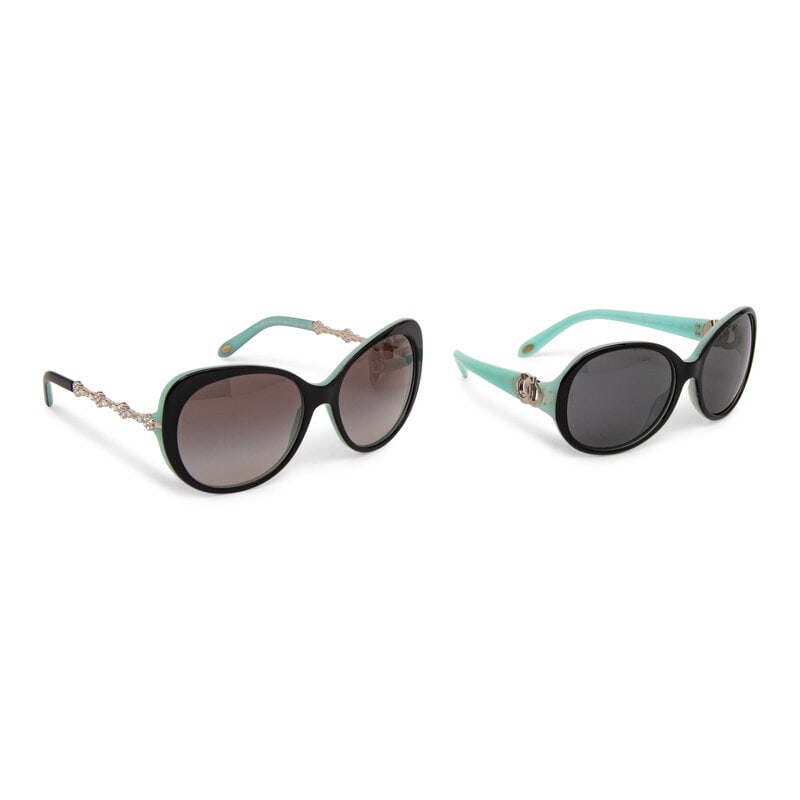 Tiffany & Co., Two Pairs of Sunglasses: Tiffany & Co., Two Pairs of Sunglasses THE FIRST Rounded sunglasses in black and Tiffany blue composite with silver-tone hardware. Includes box, leather case, and dust bag. Label: Tiffany