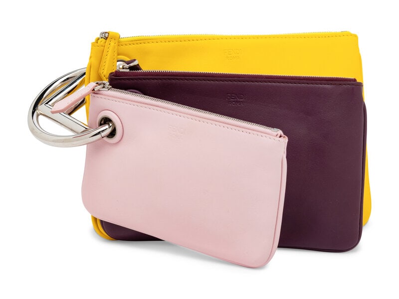 Fendi, Leather Triplette Clutch: Fendi, Leather Triplette Clutch Triplette clutch in baby pink, aubergine, and yellow leather with silver-tone hardware. Features three modular leather pouches of gradated sizes on a metal jump