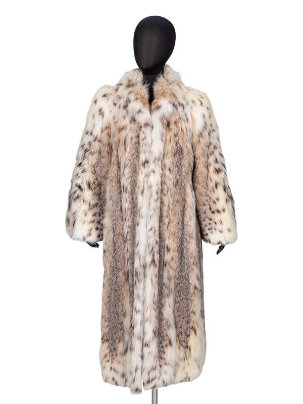 Sorbara, Lynx Fur Long Coat : Sorbara, Lynx Fur Long Coat Open-front even-eighths length fur coat in lynx fur. Spread collar. Full-length raglan sleeves. Two slit pockets at front. No closures. Fully lined; monogram em