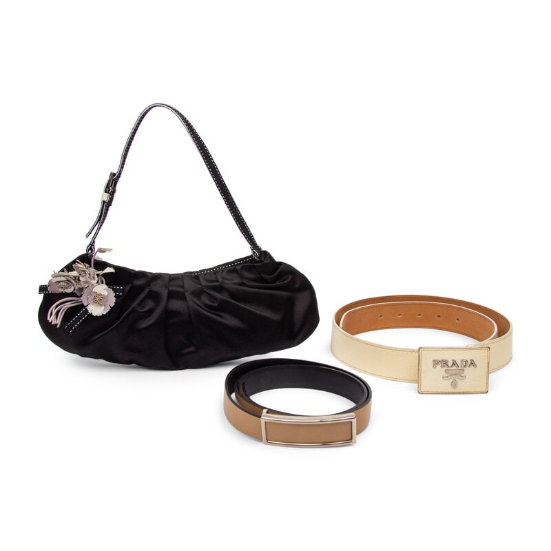 Prada, Satin Handbag & Two Belts: Prada, Satin Handbag & Two Belts THE FIRST Raso mini handbag in black silk satin with leather floral embellishments. Snap closure and black topstitched petersham & leather strap. Label: