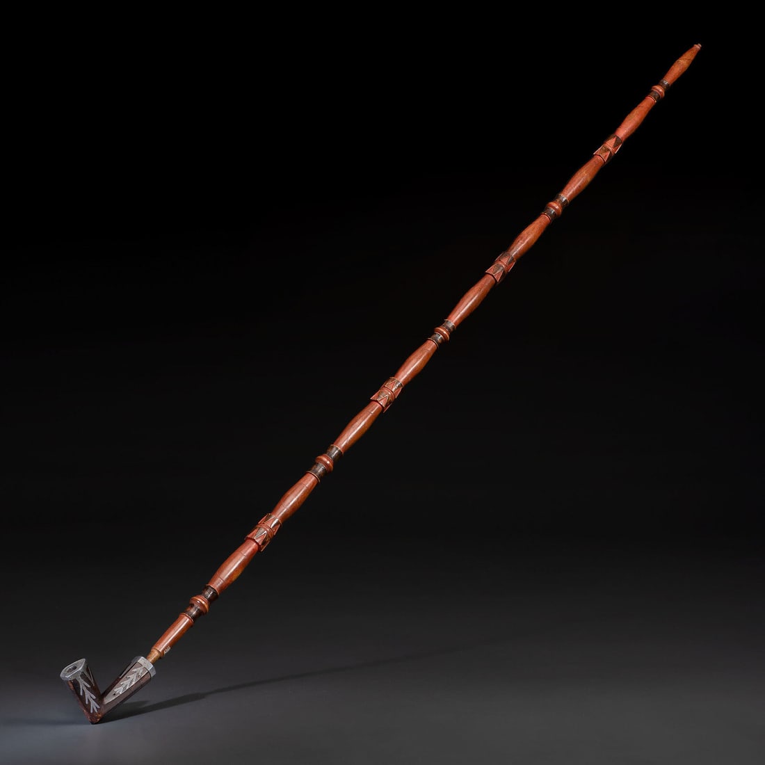 Monumental Ojibwe Calumet Pipe, with Fine Lead Inlay Burl Bowl: Monumental Ojibwe Calumet Pipe, with Fine Lead Inlay Burl Bowl late 18th - early 19th century The stem, gracefully carved, is composed of nine cylindrical segments with deeply carved triangular