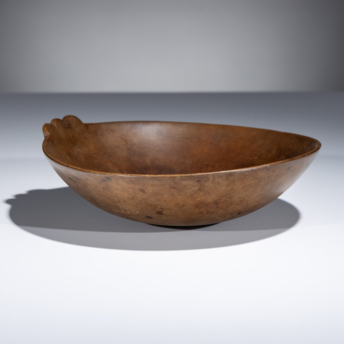 Meskwaki Burl Bowl: Meskwaki Burl Bowl 19th century round form with scalloped Manitou along one side height 3 inches x diameter 9-1/2 inches This lot is located in Chicago. Ex Paul Gray, New York