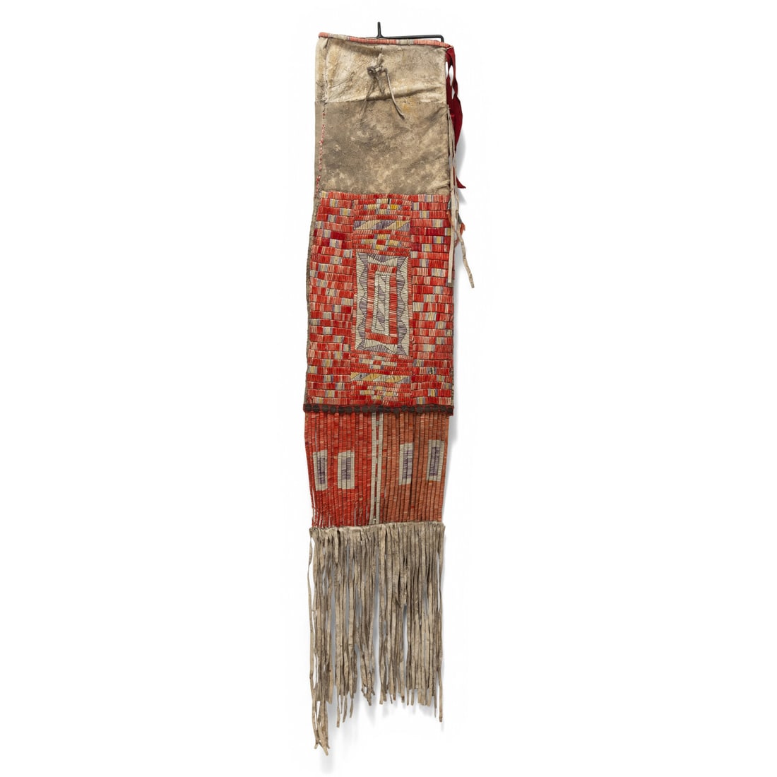Mandan Quilled Hide Tobacco Bag: Mandan Quilled Hide Tobacco Bag fourth quarter 19th century thread and sinew-sewn; brightly quilled on both sides with geometric designs; quilled rawhide slats and hide fringe line the lower edge 