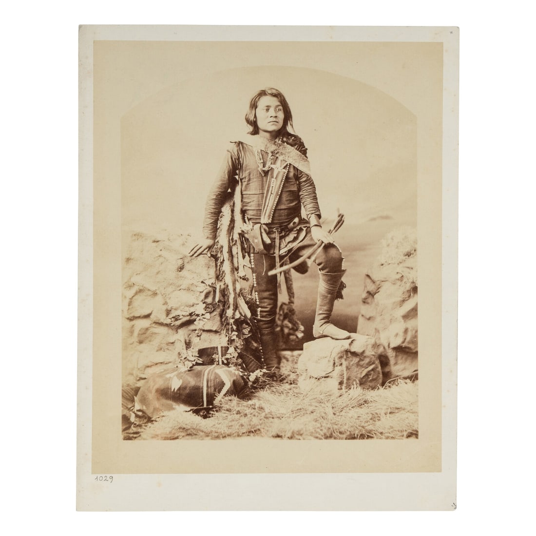 Charles Milton Bell (1848-1893) Manuelito Segundo, Navajo, ca 1874: Charles Milton Bell (1848-1893) Manuelito Segundo, Navajo, ca 1874 Albumen Photograph 8 3/4 x 7 in. albumen photograph (including margins) on later cardstock mount with "1029" written at lower left. T