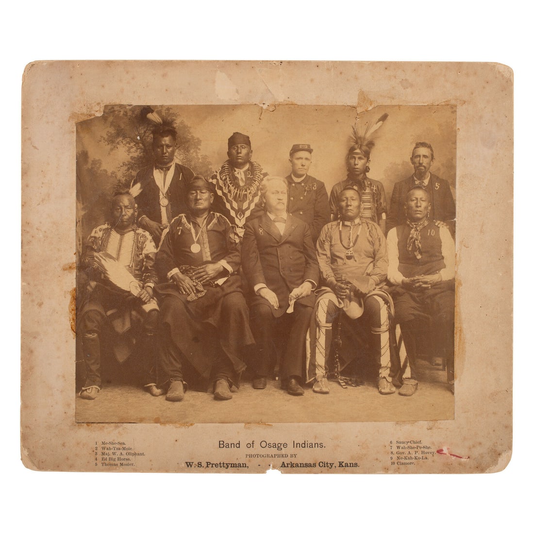 William S. Prettyman (1858-1932) Osage Leaders with Governor A.P. Hovey. Arkansas City, Kansas, ca: William S. Prettyman (1858-1932) Osage Leaders with Governor A.P. Hovey. Arkansas City, Kansas, ca 1890 albumen photograph 7 3/4 x 9 in. photograph on 10 x 12 in. mount. Individuals identified on moun