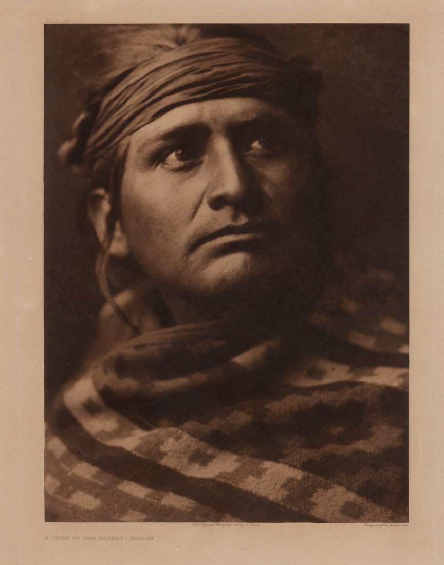 Edward S. Curtis (American, 1868-1952) A Chief of the Desert - Navaho, Plate 26: Edward S. Curtis (American, 1868-1952) A Chief of the Desert - Navaho, Plate 26 photogravure 1904, from a copyright photograph by E. J. Curtis. Printed by John Andrew & Son. (sight) 17-7/8 x