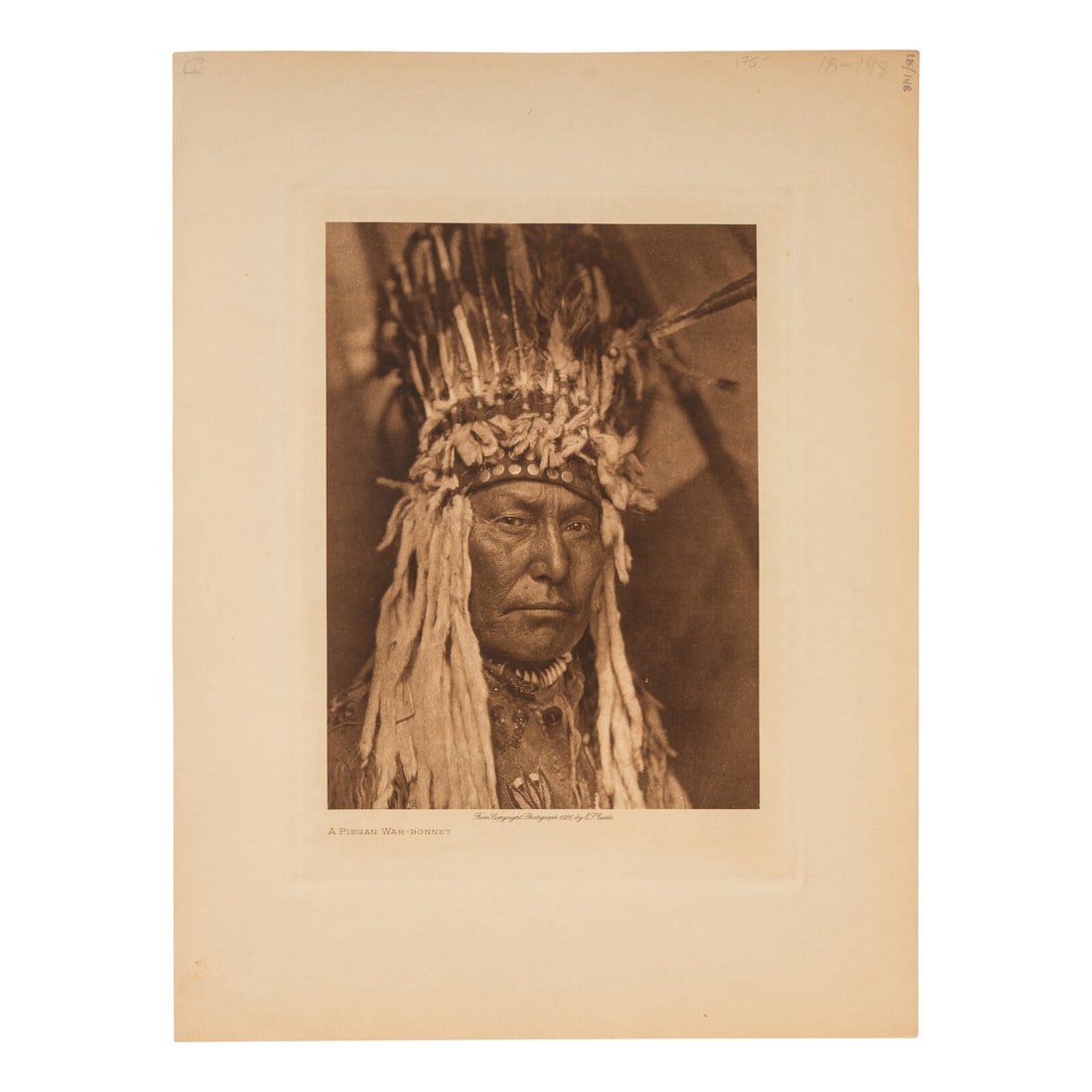 Edward S. Curtis (1868-1952) Photogravures Associated with the Piegan: Edward S. Curtis (1868-1952) Photogravures Associated with the Piegan 12 photogravures with 1900-1926 copyright dates, images approx. 7 1/4 x 5 1/4 in. (12 1/2 x 9 1/2 in. sheet). 1 volume