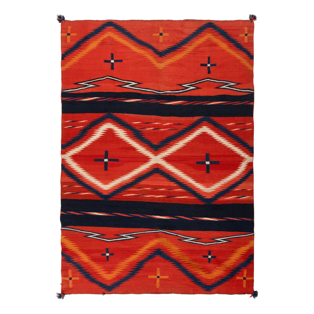 Navajo Late Classic Moki Serape [Rug]: Navajo Late Classic Moki Serape [Rug] late 19th century handspun wool woven in red, indigo, cream, and orange; serrated diamonds with Moki-style bands; corner tassels 72 x 50-1/2 inches Property