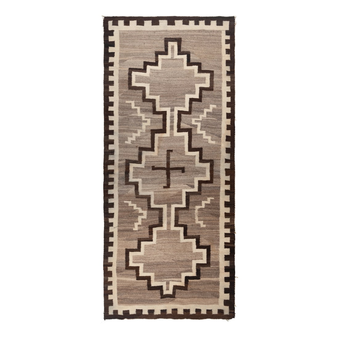 Navajo Eastern Reservation Runner [Rug]: Navajo Eastern Reservation Runner [Rug] early 20th century thick, handspun wool, woven with connecting diamonds and a crenelated border 115-1/2 x 53 inches (9 feet, 6 inches x 4 feet, 4 inches)