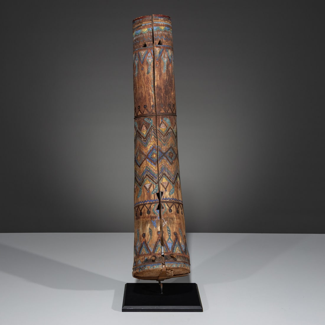Amos Gustina, Attributed (Apache, 1858-1945) Painted Fiddle: Amos Gustina, Attributed (Apache, 1858-1945) Painted Fiddle dried agave stalk vibrantly painted with geometric elements; green paint on base length 21-3/4 inches x diameter 5 inches The Ronny and Dori