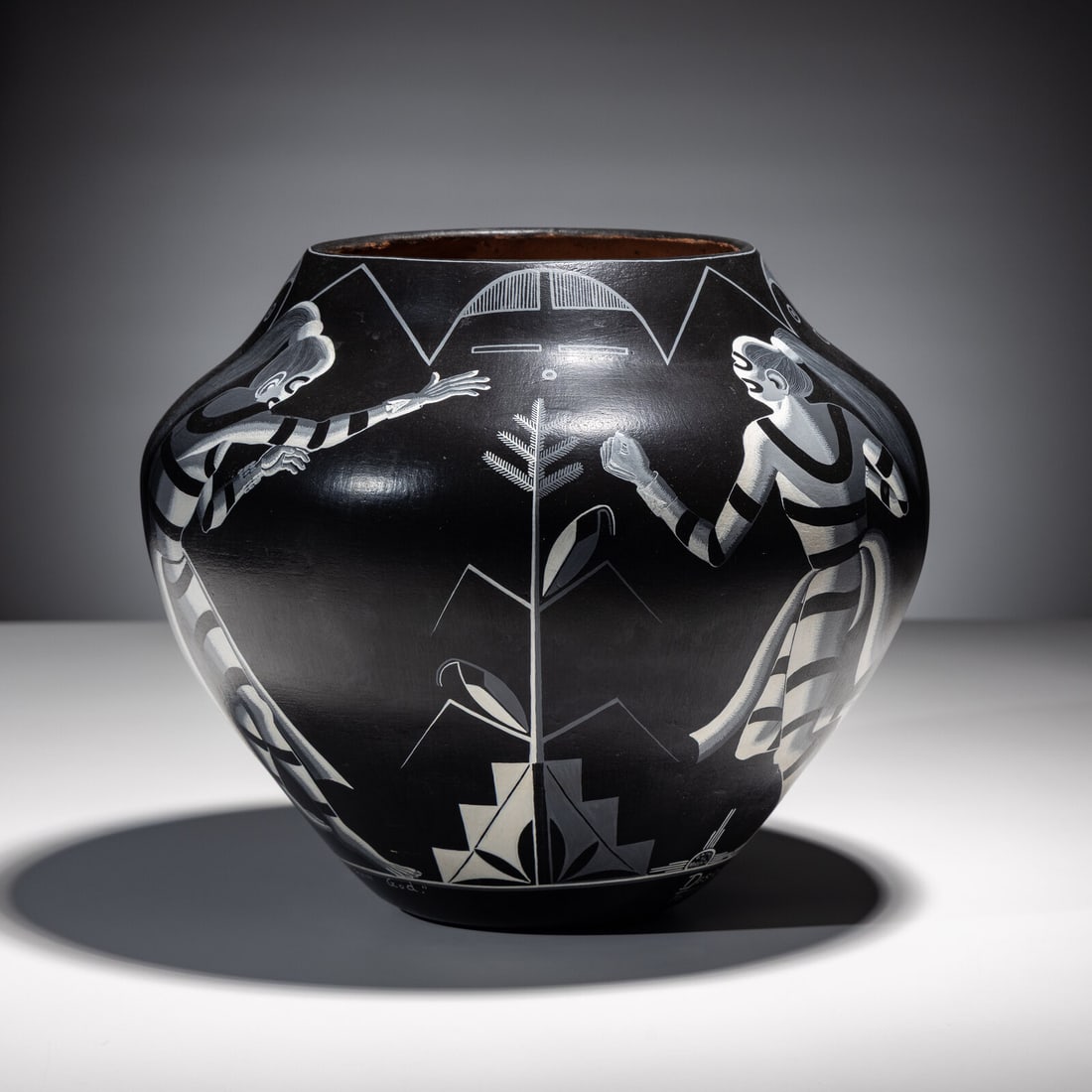 Rafael and Sophia Medina (Zia, 1929-1998 / 1932-2010) Koshares Praying to the Rain God: Rafael and Sophia Medina (Zia, 1929-1998 / 1932-2010) Koshares Praying to the Rain God titled and signed near base height 11 inches x diameter 13-1/4 inches This lot is located in Chicago.