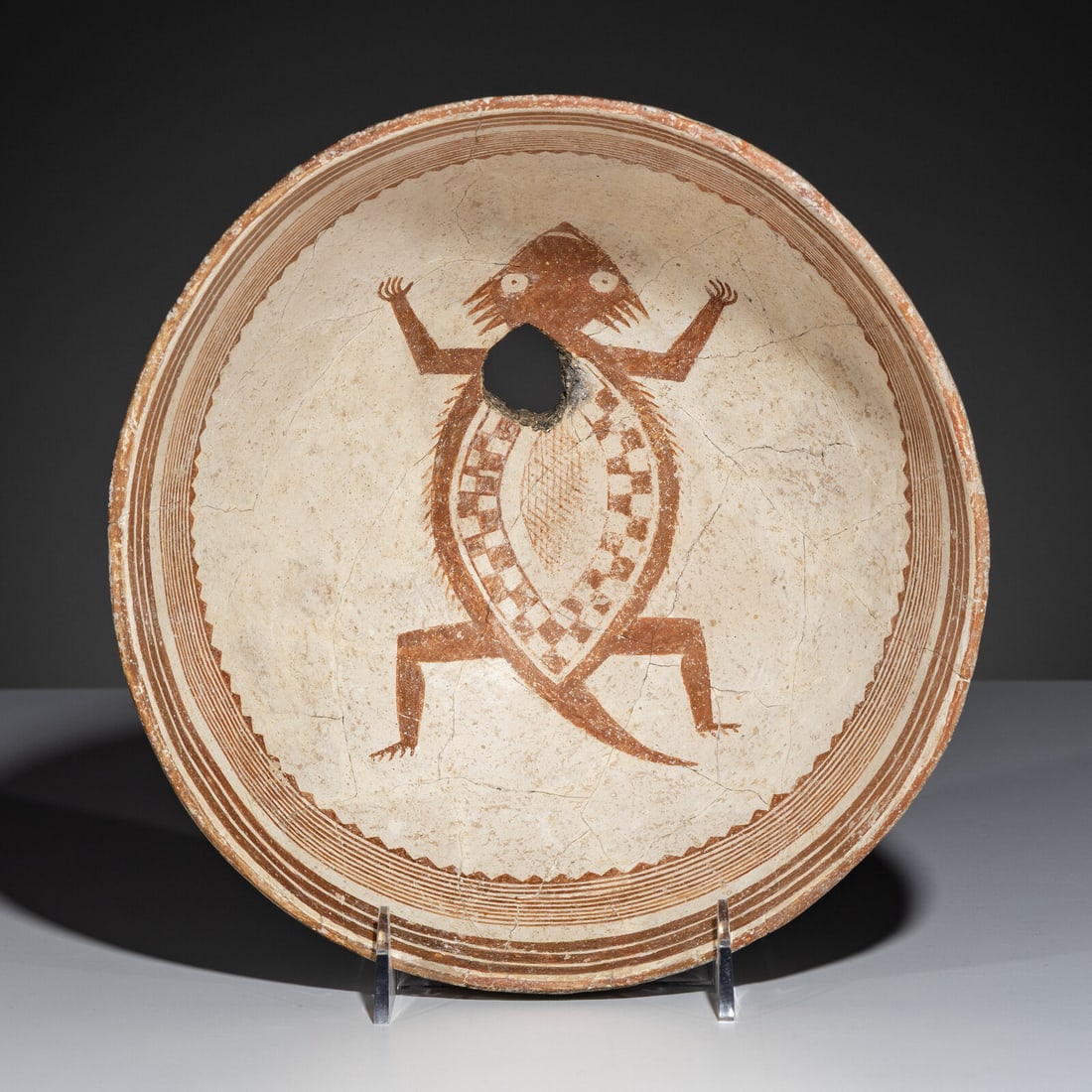 Ancestral Pueblo, Mimbres Classic Red-on-White Pottery Bowl, Horned Toad: Ancestral Pueblo, Mimbres Classic Red-on-White Pottery Bowl, Horned Toad A.D. 1000-1140 height 4-1/2 inches x diameter 9-5/8 inches From an Old Hollywood Family This lot is located in Chicago. Ex