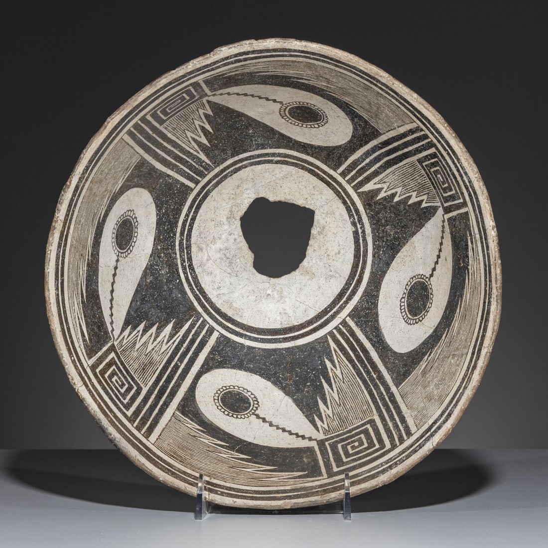 Ancestral Pueblo, Mimbres Classic Black-on-White Pottery Bowl: Ancestral Pueblo, Mimbres Classic Black-on-White Pottery Bowl A.D. 1000-1140 complex design, possibly representative of a comet height 6 inches x diameter 12 inches From an Old Hollywood Family This