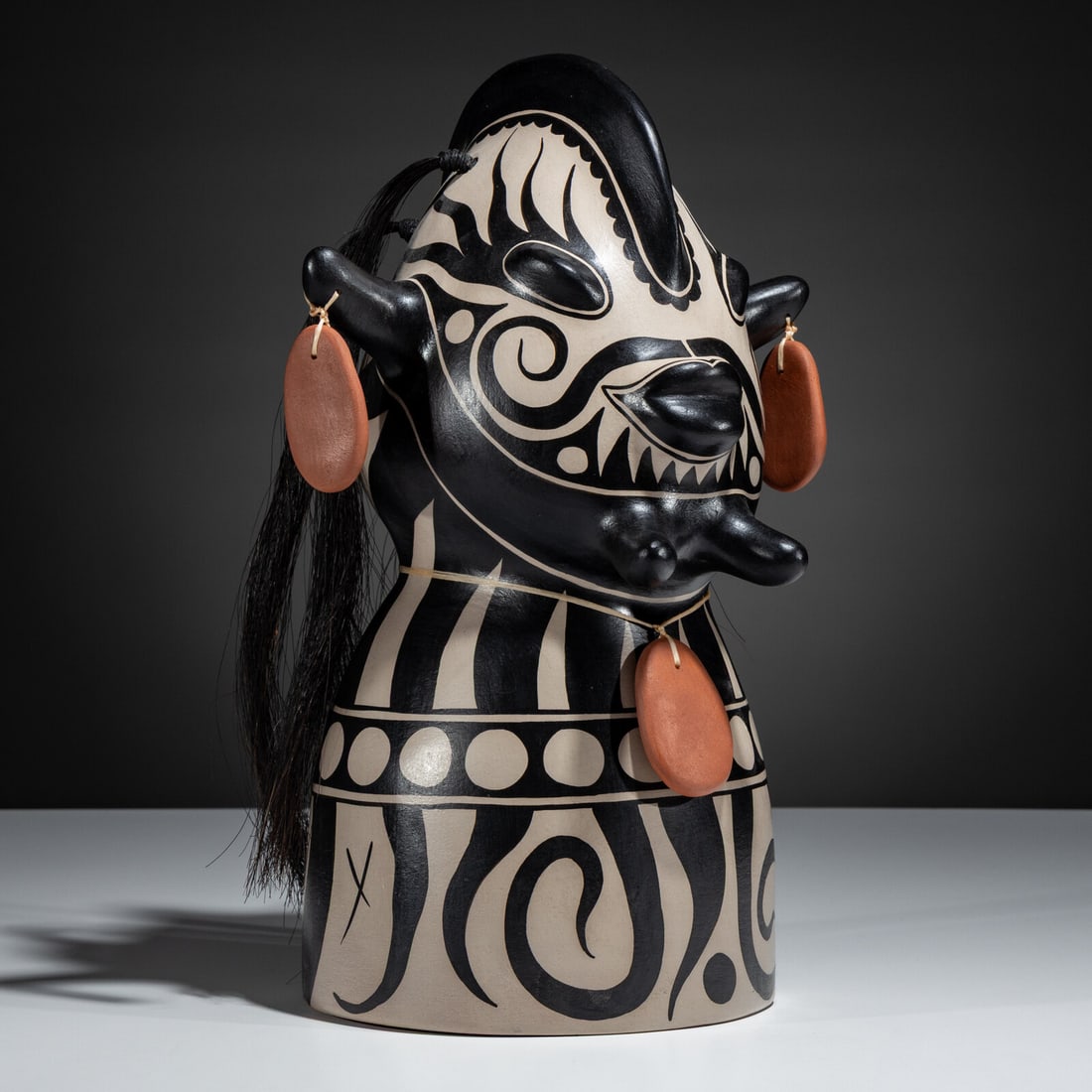 Virgil Ortiz (Cochiti, b. 1969) Pottery Figural Bust: Virgil Ortiz (Cochiti, b. 1969) Pottery Figural Bust alien-like in form, with protrusions at the chin, forehead, and ears; painted overall with geometric designs and further adorned with horsehair