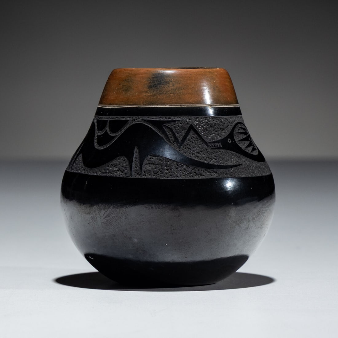 Tony Da (San Ildefonso, 1923-1971) Black and Sienna Sgraffito Pottery Jar (1 of 6)