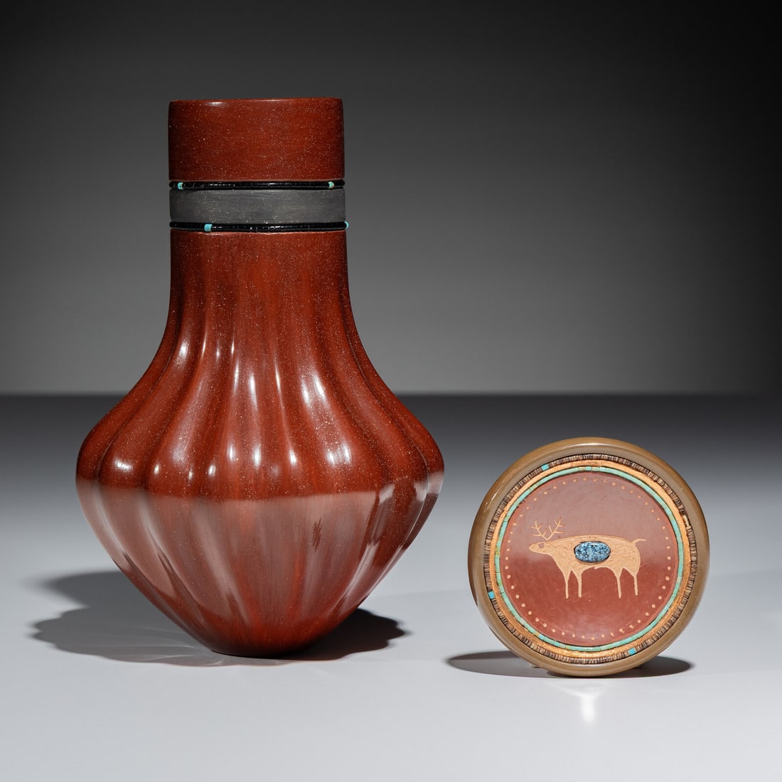 Russell Sanchez (San Ildefonso, b. 1963) Redware Pottery: Russell Sanchez (San Ildefonso, b. 1963) Redware Pottery lot of 2, includes: a ribbed red and black micaceous vase with two beaded strands; signed on base, height 6-1/2 inches x diameter 4-1/4 inches