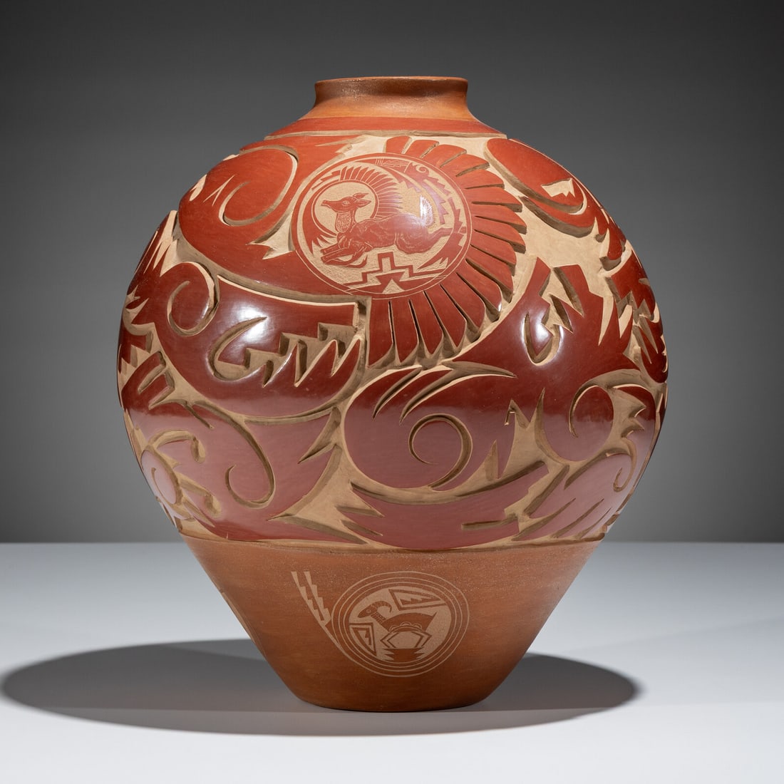 Grace Medicine Flower (Santa Clara, b. 1938) Large Three-Toned Deeply Carved Pottery Jar, 1992: Grace Medicine Flower (Santa Clara, b. 1938) Large Three-Toned Deeply Carved Pottery Jar, 1992 decorated with a deeply carved Avanyu along with winged and geometric elements; further embellished with