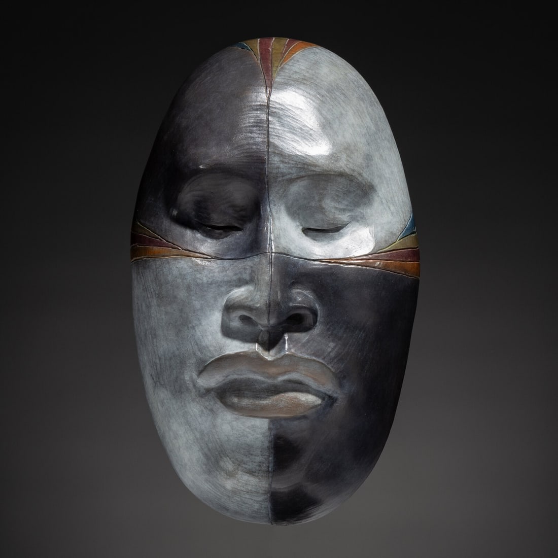 Roxanne Swentzell (Santa Clara, b. 1962) Faces of Indian Market, 2010: Roxanne Swentzell (Santa Clara, b. 1962) Faces of Indian Market, 2010 bronze titled, signed, and edition 10/15 on inside length 9-1/2 inches x width 5-3/4 inches Property from the Collection of Dr. De