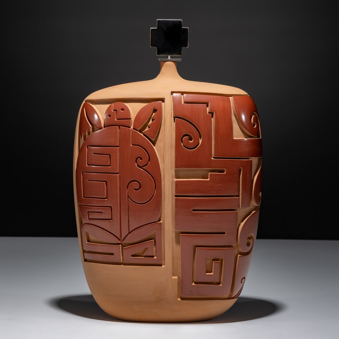 Tammy Garcia and Mike Bird Romero Collaboration (Santa Clara, b. 1969 / Ohkay Owingeh-Taos, b.: Tammy Garcia and Mike Bird Romero Collaboration (Santa Clara, b. 1969 / Ohkay Owingeh-Taos, b. 1940) Carved Redware Pottery VaseFebruary 1999 with a sterling silver stopper set with a jet cross, hallm