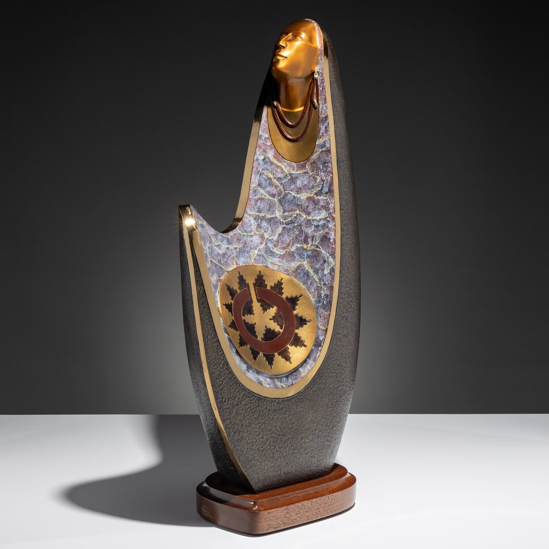 Larry Yazzie (Diné, b. 1958) Nizhoni: Larry Yazzie (Diné, b. 1958) Nizhoni patinated and incised bronze signed and edition 9/24 on front near base height 27-1/4 inches x length 13-1/4 inches x width 7 inches This lot is located