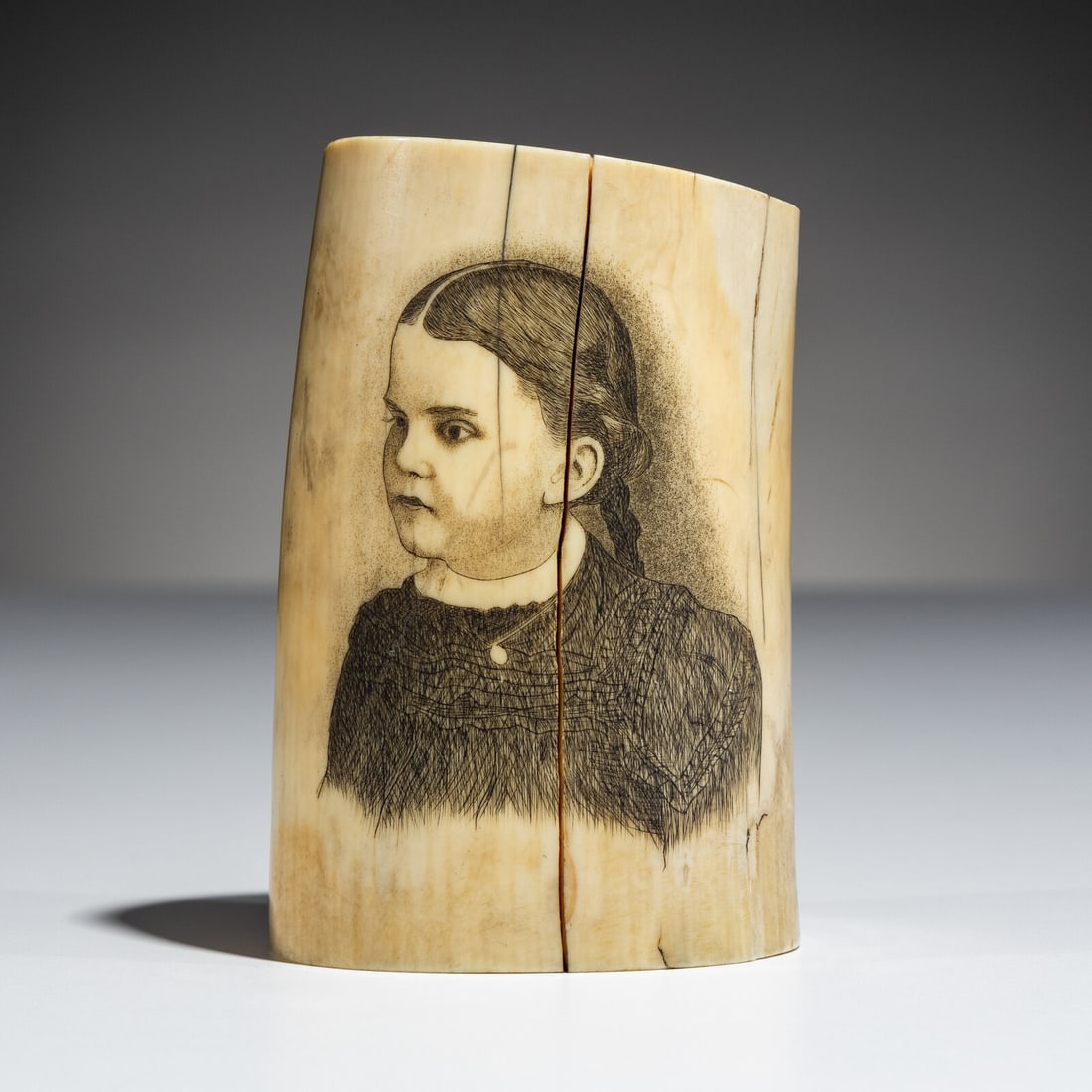 Happy Jack Angokwazhuk, Attributed (Iñupiaq, 1873-1918) Double Scrimshawed Portrait of Della: Happy Jack Angokwazhuk, Attributed (Iñupiaq, 1873-1918) Double Scrimshawed Portrait of Della and Johnny Beauca 1904 scrimshawed with two portraits of a young boy and girl; included is a