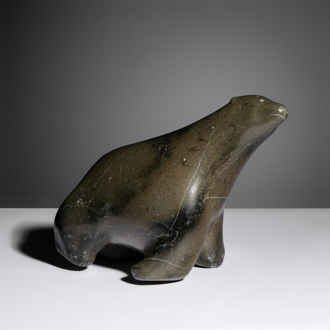 Pauta Saila (Inuit [Kinngait], 1916-2009) Bear: Pauta Saila (Inuit [Kinngait], 1916-2009) Bear stone signed in Roman and with Igloo label height 6-1/2 inches x length 10-1/2 inches x width 4-1/2 inches Exhibited: 2023 Objects of Substance: