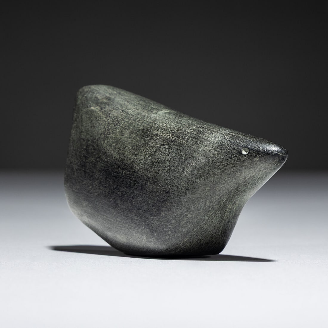 John Pangnark (Inuit [Arviat], 1920-1980) Ptarmigan, 1968: John Pangnark (Inuit [Arviat], 1920-1980) Ptarmigan, 1968 steatite signed faintly in syllabics and marked 21530-5 height 2 inches x length 3-1/2 inches This lot is located in Chicago. Purchased