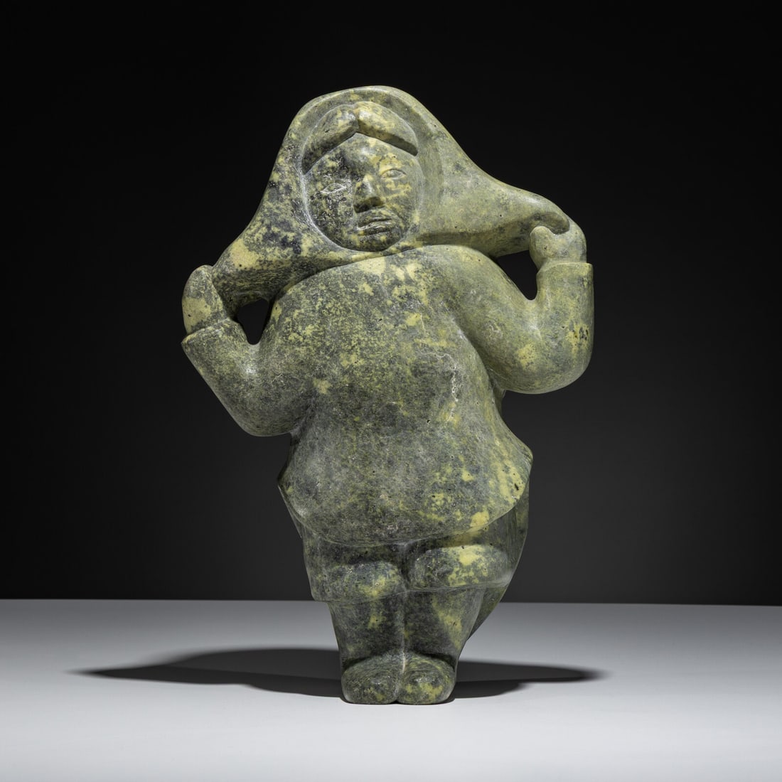 Kaka Ashoona (Inuit [Kinngait], 1928-1996) Woman: Kaka Ashoona (Inuit [Kinngait], 1928-1996) Woman stone unsigned height 13-1/2 inches x width 9 inches This lot is located in Chicago. Purchased at ABorigin Art Gallery, Vancouver