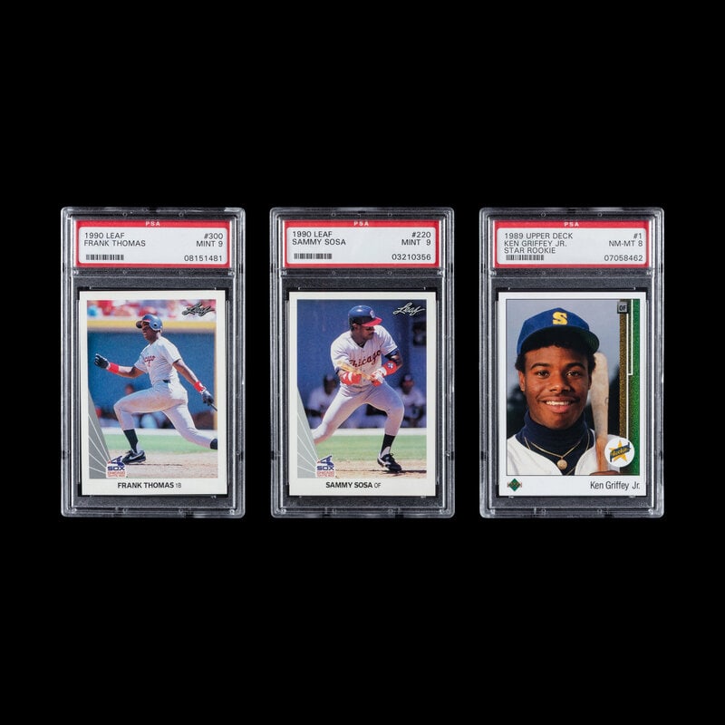 A Collection of Baseball Rookie Cards Including 1989 Upper Deck Ken Griffey Jr. (PSA 8 NM-MT): A Collection of Baseball Rookie Cards Including 1989 Upper Deck Ken Griffey Jr. (PSA 8 NM-MT) comprising 1990 Leaf Frank Thomas (PSA 9); 1989 Upper Deck Ken Griffey Jr. (PSA 8); 1990 Leaf Sammy Sosa (