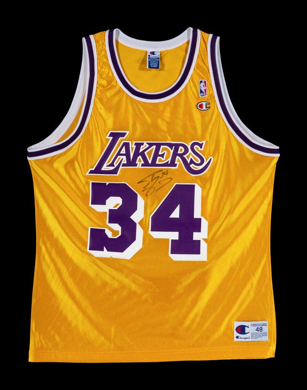 A Shaquille O'Neal Signed Autograph Los Angeles Lakers Jersey : A Shaquille O'Neal Signed Autograph Los Angeles Lakers Jersey Inscribed "Shaquille O'Neal 34" in black Sharpie across front of vintage Champion Los Angeles Lakers jersey. Framed 27 x 35 1/2