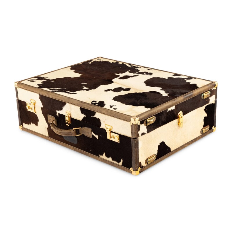 A Pony-Skin Hard Side Suitcase: A Pony-Skin Hard Side Suitcase 20th Century Height 23 x width 29 1/4 x depth 9 1/2 inches. This lot is located in Chicago. 