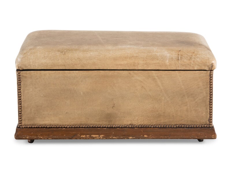 A Contemporary Leather-Upholstered Ottoman: A Contemporary Leather-Upholstered Ottoman the covered hinged to open for storage.Height 15 x width 30 x depth 18 inches. Property from a Private Illinois Collecto