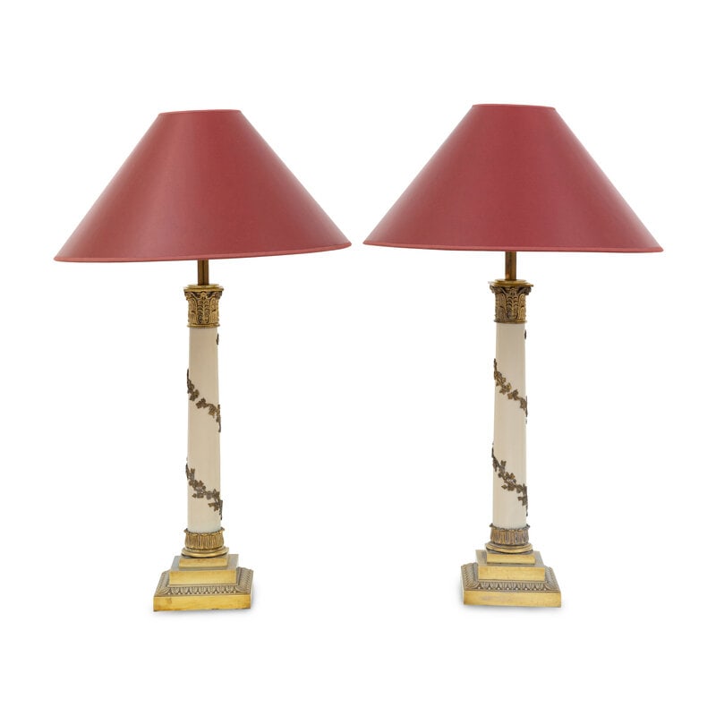 A Pair of Neoclassical Style Cream-Painted Gilt-Metal Lamps: A Pair of Neoclassical Style Cream-Painted Gilt-Metal Lamps Mid-20th Century Together with red paper shades. Height to finial 36 inches. This lot is located i
