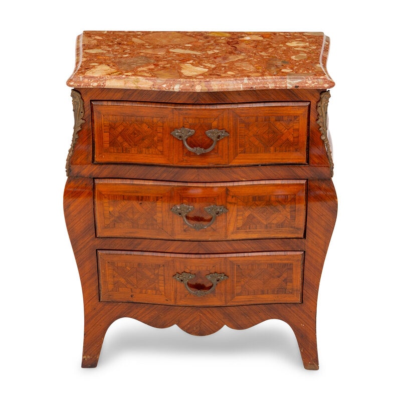 A French Parquetry Commode: A French Parquetry Commode First Half 20th Century Height 24 1/2 x width 20 1/2 x depth 13 inches. This lot is located in Palm Beach.