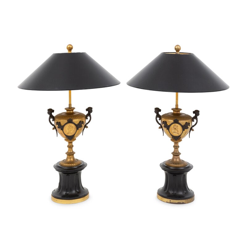 A Pair of French Gilt Bronze Urns Mounted as Lamps: A Pair of French Gilt Bronze Urns Mounted as Lamps 19th Century with custom shades.Height 24 inches. This lot is located in Palm Beach.