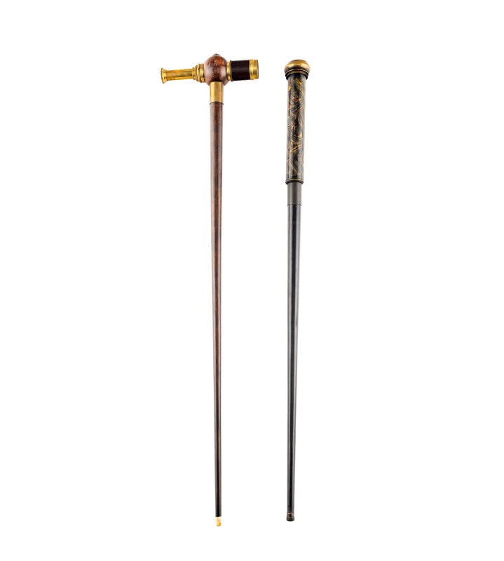 Two Gentleman's Walking Sticks: Two Gentleman's Walking Sticks 19th Century one extending into a telescope and the other storing game tokens.Length of longer 37 inches. Property from the Collection
