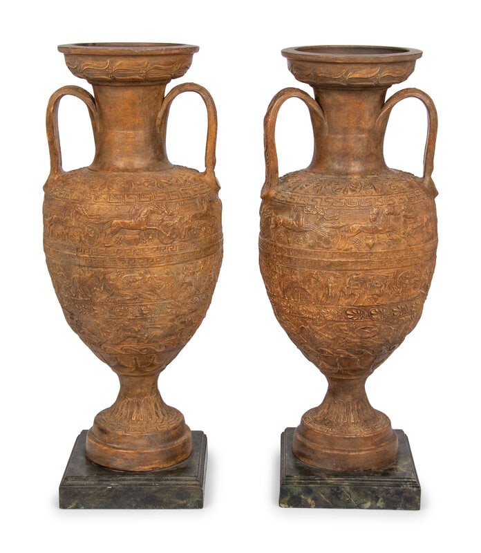 A Pair of Continental Composition Urns: A Pair of Continental Composition Urns 20th Century Height 26 1/2 x width over handles 11 inches. This lot is located in Chicago. 