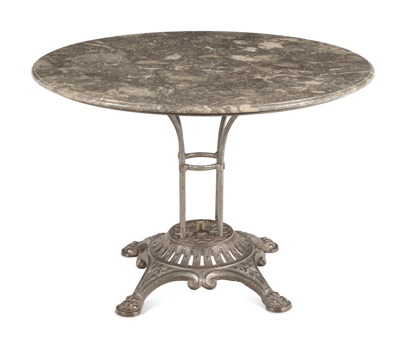A Continental Cast Iron Center Table: A Continental Cast Iron Center Table 20th Century Height 28, diameter 42 inches. This lot is located in Chicago. 