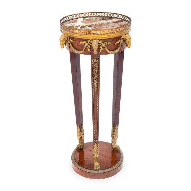 An Empire Style Gilt Bronze Mounted Gueridon with Marble Top: An Empire Style Gilt Bronze Mounted Gueridon with Marble Top Late 19th/Early 20th Century Height 30 5/8 x diameter of top 13 5/8 inches. This lot is located in Pal