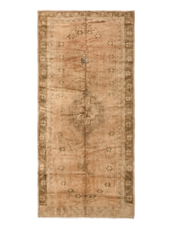 An Oushak "Corridor" Rug: An Oushak "Corridor" Rug West Anatolia, Circa 1900 9 feet 10 inches x 4 feet 10 inches. Property from a Private Family Trust This lot is located in Chicago.