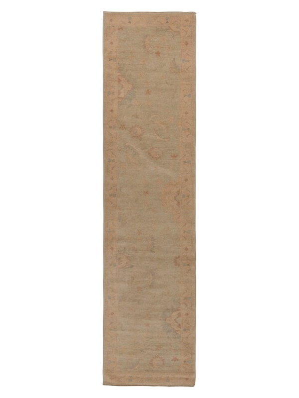 An Oushak Runner: An Oushak Runner West Anatolia, 20th Century 12 feet 8 inches x 3 feet 1 inch. Property from a Private Family Trust This lot is located in Chicago. ConditionChemically washed to neutralize the